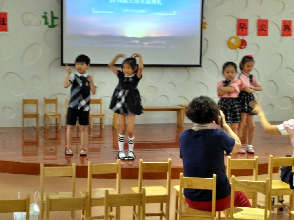 The students paraded on stage in pairs and did cute poses in turn.  Too adorable!!!!