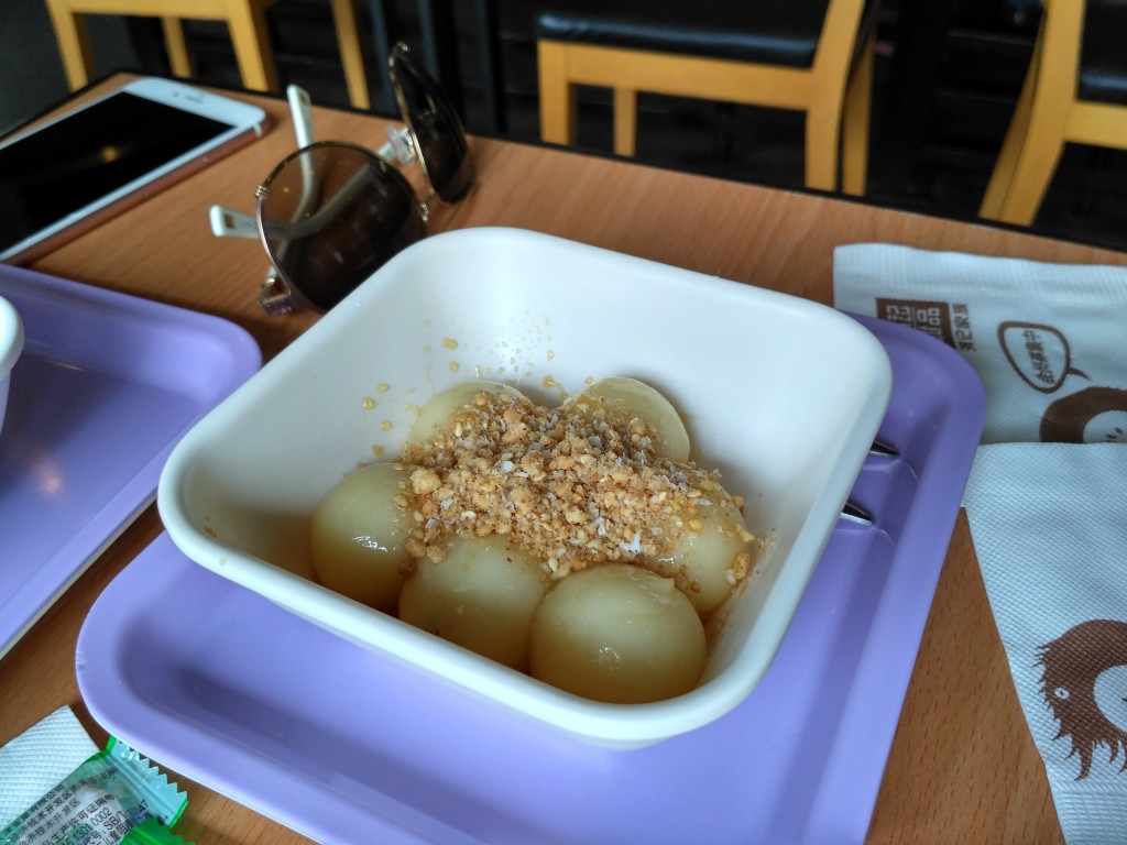 Sweet rice balls with peanut.  Was not expecting them to be warm.