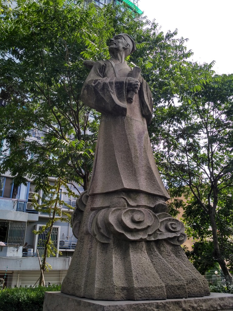 Majestic statue of a scholar greeting me on the edge of an apartment neighborhood.  Didn't catch his name though it's written on the plaque.