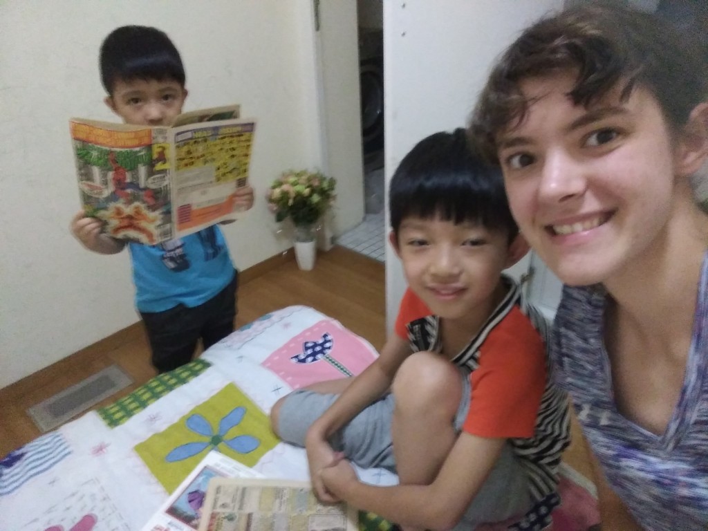 Admiring my Spider-Man comics.  I got them from the bargain bin and they were disintegrating in the attic at home so I brought them to China with me to share a little bit of American culture before they turn to dust.