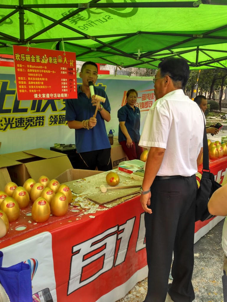 Try your luck at this golden egg smashing tent and try to win a new iphone.