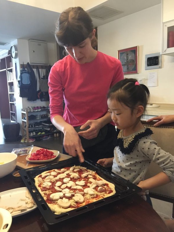 The master pizza chef at work. Sophia's been training for weeks, and it's finally time for the practical application.