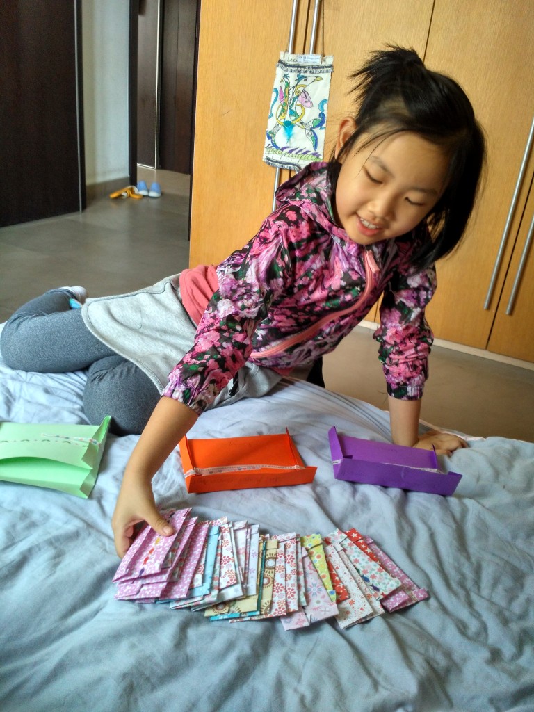 Leeya loves making paper envelopes.  Sophia helped her make 20 altogether!