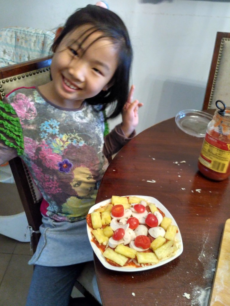 Leeya, let me take a picture of you and your beautiful pizza now, because I have a feeling a trip through the microwave could ruin it's careful design.